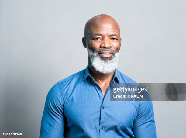 portrait of confident businessman. - 55 to 60 years old african american male stock pictures, royalty-free photos & images