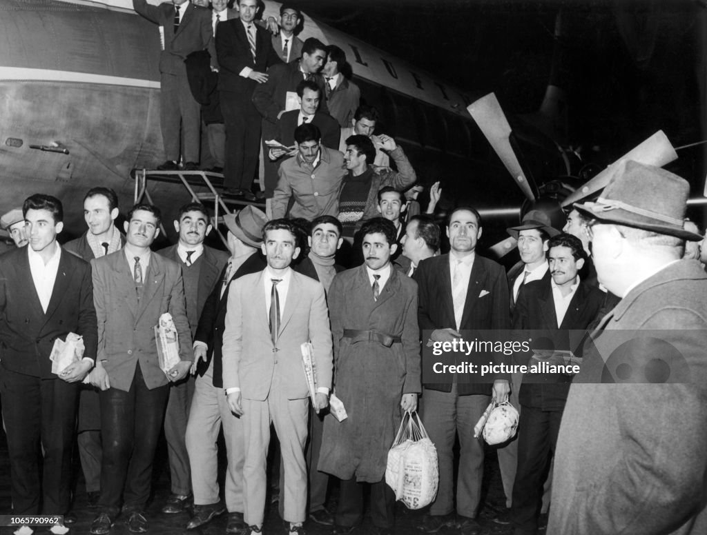 Guest Worker Example 55 Turkish guest workers arrive at the airport in Düsseldorf on the ...
