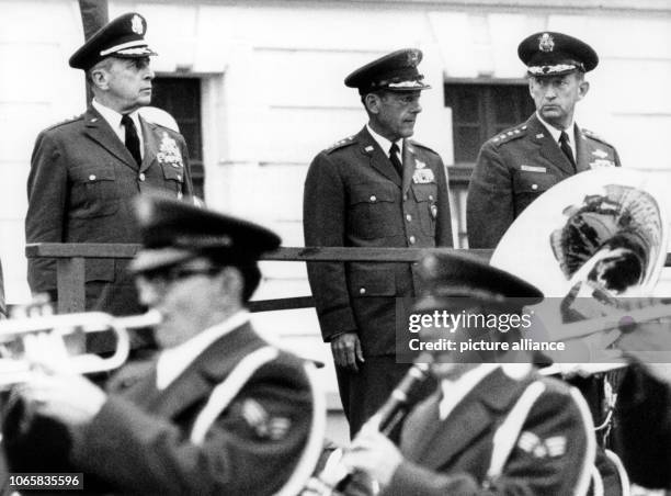 Generals Lyman L. Lemnitzer, Joseph Holzapple, and Horace M. Wade during a military parade in honor of Wade's discharge at Lindsey baracks in...