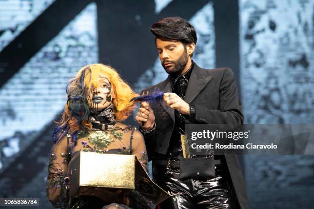 Italian Hairstylist Federico Lauri is seen during is seen during the 'FEDERICO FASHION STYLE - Angel & Devil' part of "On Hair Show & Exhibition"...