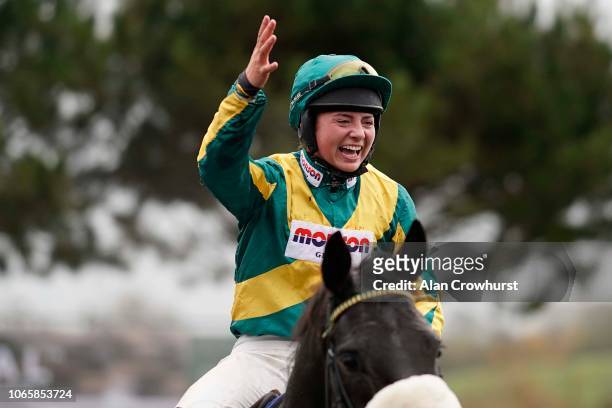 Bryony Frost celebrates after riding Present Man to win The Badger Ales Trophy Handicap Chase at Wincanton Racecourse on November 10, 2018 in...