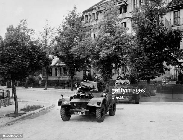 Soldiers of the French Hussard Regiments patrol the streets of the allied zone of Berlin on armored vehicules, on July 07, 1948 during the Berlin...