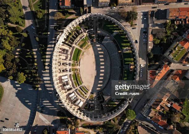 aerial view of roman amphitheatre in pula. istria, croatia. - pula croatia stock pictures, royalty-free photos & images