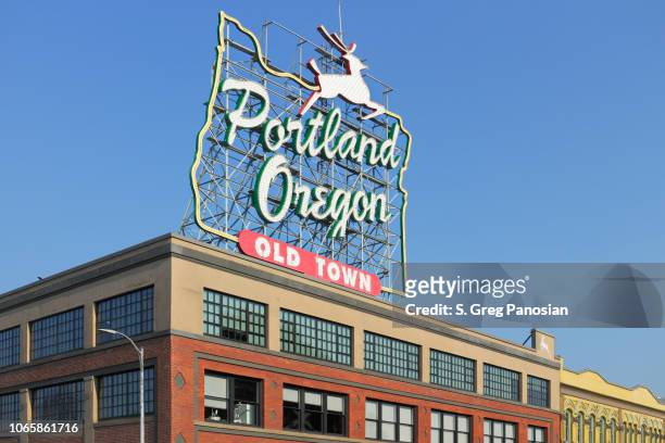 white stag sign - portland - oregon - portland neon sign stock pictures, royalty-free photos & images