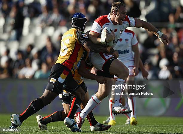 Gareth Ellis of England takes the ball forward during the Four Nations match between England and Papua New Guinea at Eden Park on November 6, 2010 in...