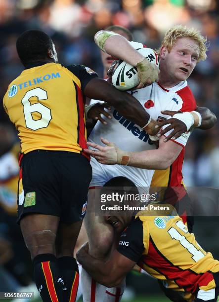 James Graham of England looks to offload during the Four Nations match between England and Papua New Guinea at Eden Park on November 6, 2010 in...