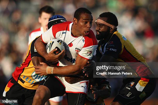 Leroy Cudjoe of England takes the ball forward during the Four Nations match between England and Papua New Guinea at Eden Park on November 6, 2010 in...