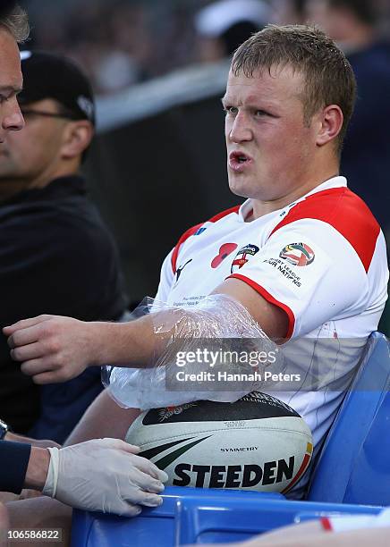 Luke Robinson of England sits injured on the bench during the Four Nations match between England and Papua New Guinea at Eden Park on November 6,...