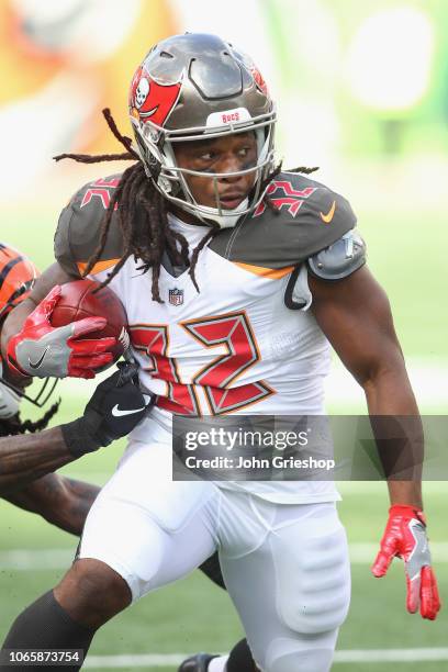 Jacquizz Rodgers of the Tampa Bay Bucccaneers runs the football upfield during the game against the Cincinnati Bengals at Paul Brown Stadium on...