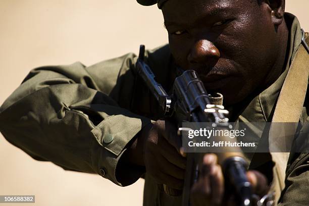 Chadian soldiers train before going on patrol in the bush of Zakouma National Park to stop the poachers attempting to kill elephants for their ivory...