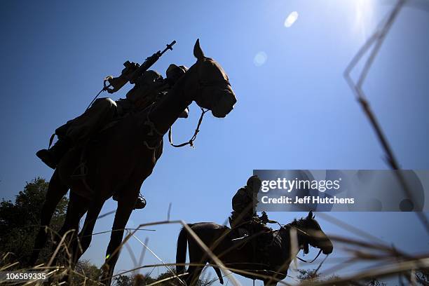 Chadian soldiers patrol the bush of Zakouma National Park on horseback to stop the poachers attempting to kill elephants for their ivory on October...