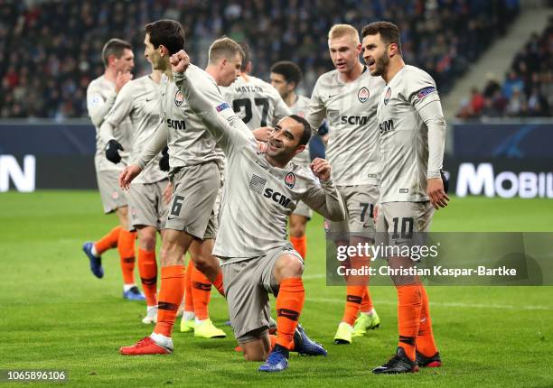 Ismaily of Shakhtar Donetsk celebrates after scoring his team's first goal with team mates during the Group F match of the UEFA Champions League...