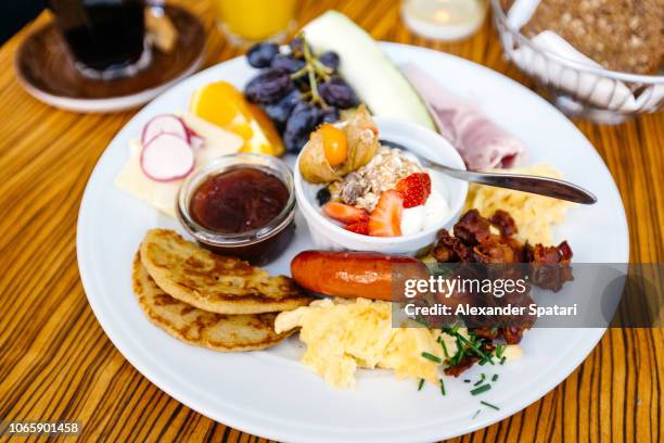 various buffet brunch food on a plate, side view - hotel breakfast bildbanksfoton och bilder