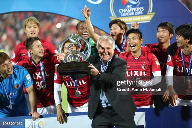 Zico and Kashima Antlers players celebrate with trophy during the AFC Champions League final second leg match between Persepolis and Kashima Antlers...