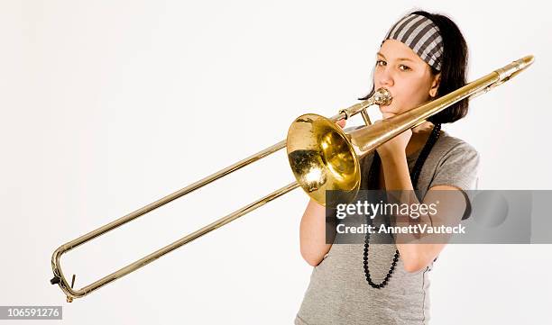 young musician serie - trombone stockfoto's en -beelden