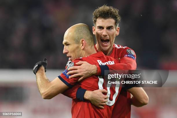 Bayern Munich's Dutch midfielder Arjen Robben celebrates scoring the 2-0 goal with his teammate German midfielder Leon Goretzka during the UEFA...