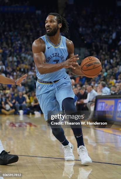 Wayne Selden of the Memphis Grizzlies looks to pass the ball against the Golden State Warriors during an NBA basketball game at ORACLE Arena on...