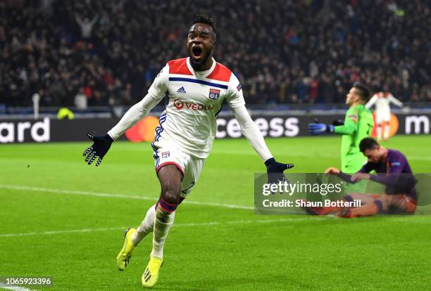 Maxwel Cornet of Olympique Lyonnais celebrates as he scores his team's second goal during the UEFA Champions League Group F match between Olympique...