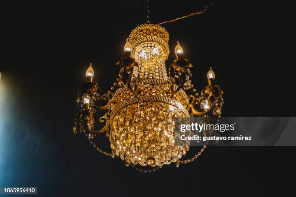 old lamp chandelier on - chandeliers foto e immagini stock