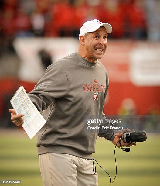 Coach Bo Pelini of the Nebraska Cornhuskers asks for an explaination of a call during second half action of their game against the Missouri Tigers at...