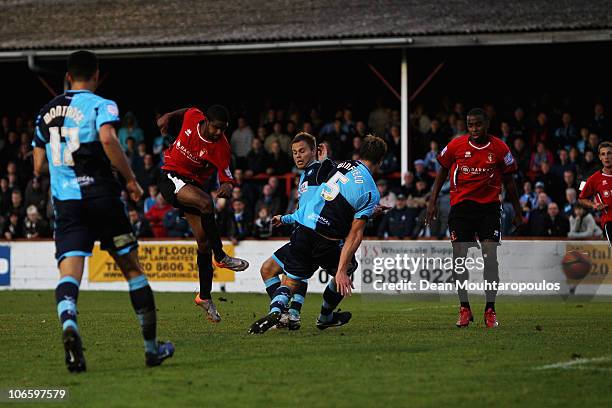 Bradley Pritchard of Hayes & Yeading shoots and scores his team first goal of the game during the Hayes and Yeading United FC and Wycombe Wanderers...