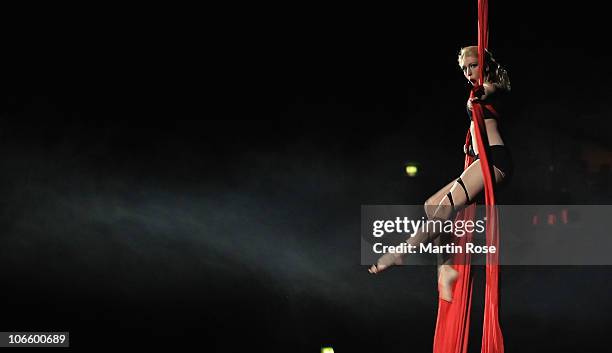 An artist performs before the Toyota Handball Bundesliga match between HSV Hamburg and SG Flensburg-Handewitt at the o2 World Arena on November 6,...