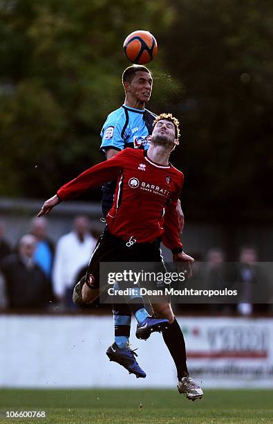 Jamie Hand of Hayes & Yeading is beaten to the header by Lewis Montrose of Wycombe during the Hayes and Yeading United FC and Wycombe Wanderers FA...