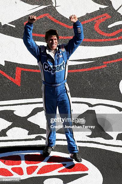 Carl Edwards, driver of the Copart.com Ford, celebrates after winning the NASCAR Nationwide Series O'Reilly Auto Parts Challenge at Texas Motor...