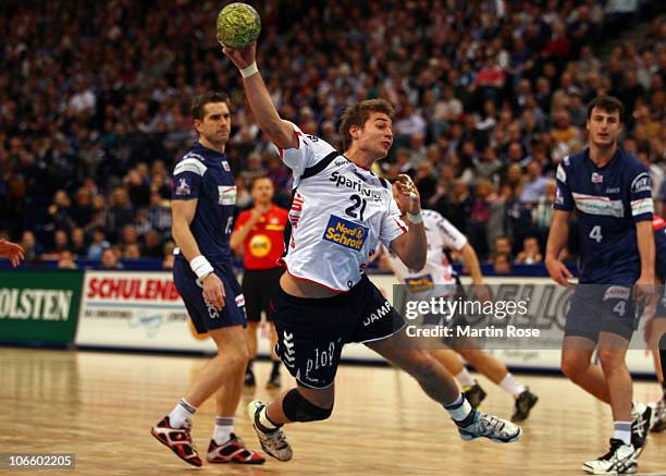 Jacob Heinl of Flensburg throws at goal during the Toyota Handball Bundesliga match between HSV Hamburg and SG Flensburg-Handewitt at the o2 World...