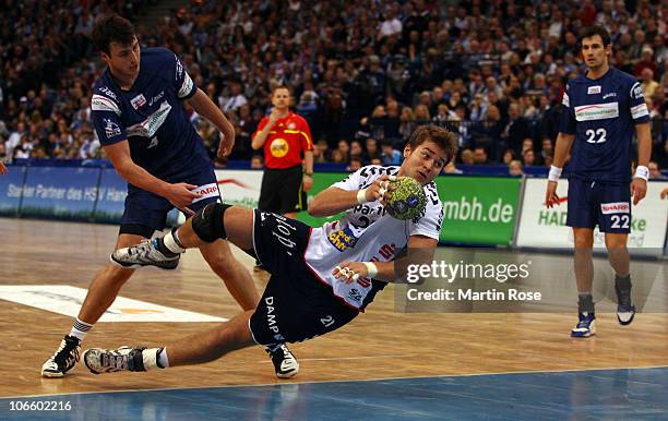 Jacob Heinl of Flensburg throws at goal during the Toyota Handball Bundesliga match between HSV Hamburg and SG Flensburg-Handewitt at the o2 World...