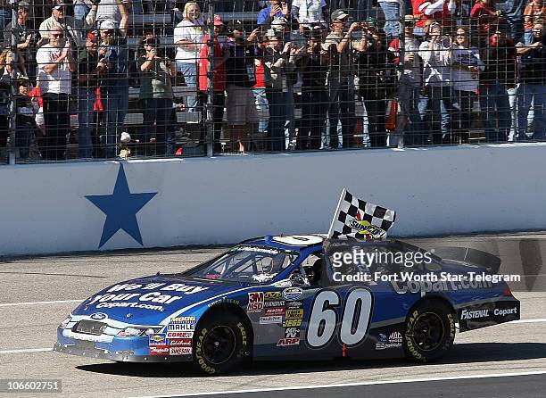 Nationwide Series driver Carl Edwards celebrates his victory in NASCAR Nationwide Series O�Reilly Auto Parts Challenge at Texas Motor Speedway in...
