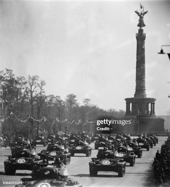 American tanks and allied troops parade in September 1945 on Charlottenburger Chaussee, which was to be the central line between the east and west...