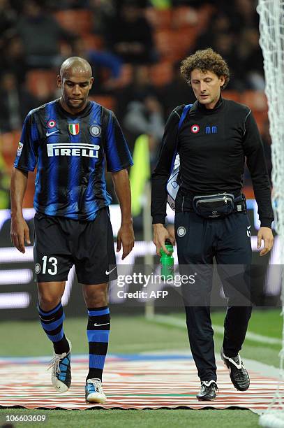 Inter Milan's Brazilian defender Maicon leaves the pitch after being injured on November 6, 2010 during his team's Serie A football match against...