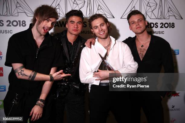 Seconds of Summer pose in the awards room with the ARIA Award for Song of The Year during the 32nd Annual ARIA Awards 2018 at The Star on November...