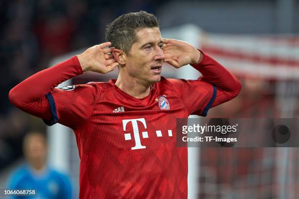 Robert Lewandowski of Bayern Muenchen celebrates after scoring his team's third goal during the Group E match of the UEFA Champions League between FC...