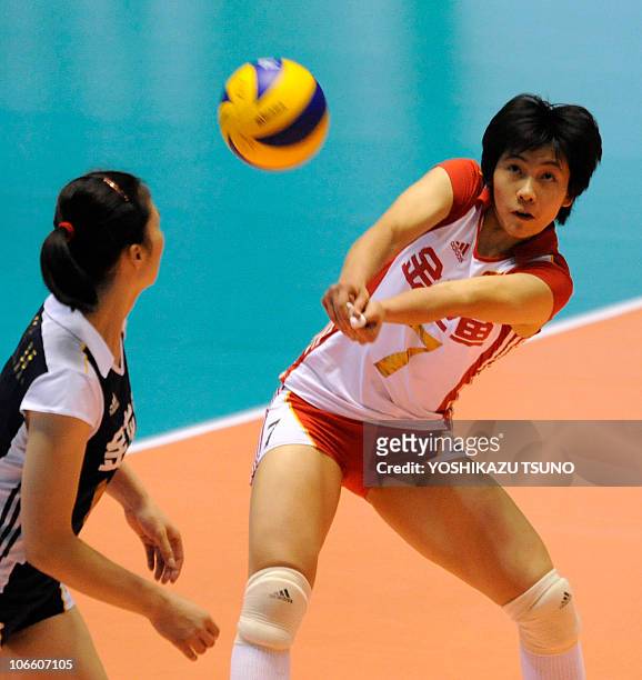 Zhang Xian of China receives the ball against Serbia during their Pool E second round match at the World Women's Volleyball Championship in Tokyo on...