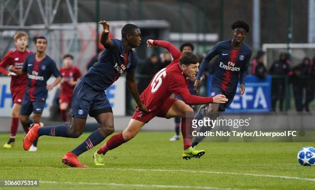 Bobby Duncan of Liverpool and Nianzou Kouassi of Paris in action during the UEFA Youth League match betwen Paris Saint-Germain U19 and Liverpool U19...