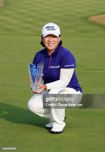 Ji-Yai Shin of South Korea poses with the tournament trophy during the final round of the Mizuno Classic at Kintetsu Kashikojima Country Club on...