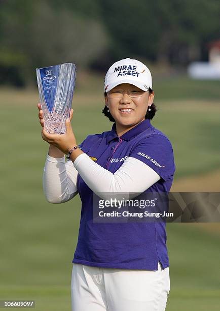 Ji-Yai Shin of South Korea poses with the tournament trophy during the final round of the Mizuno Classic at Kintetsu Kashikojima Country Club on...