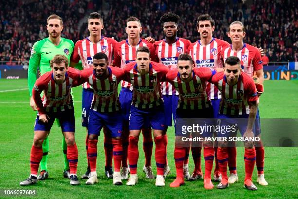 Atletico Madrid's players pose before the UEFA Champions League group A football match between Atletico Madrid and Monaco at the Wanda Metropolitan...