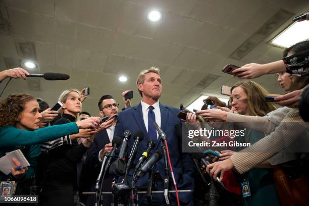 Sen. Jeff Flake speaks to the press after receiving a briefing from U.S. Secretary of Defense Jim Mattis and U.S. Secretary of State Mike Pompeo on...