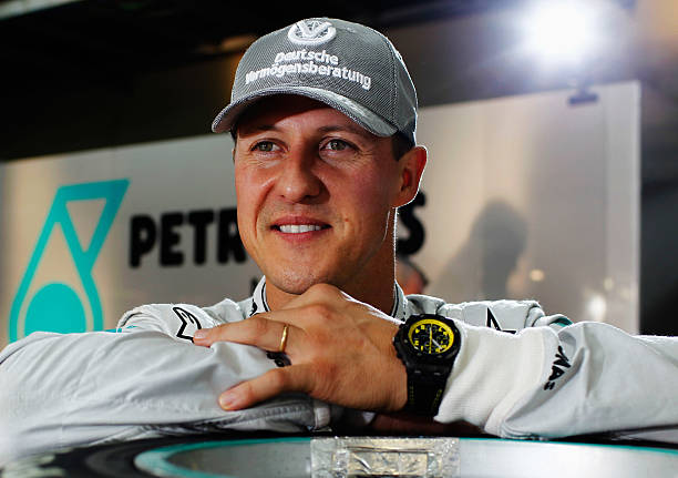Michael Schumacher of Germany and Mercedes GP poses for a photograph before qualifying for the Brazilian Formula One Grand Prix at the Interlagos...