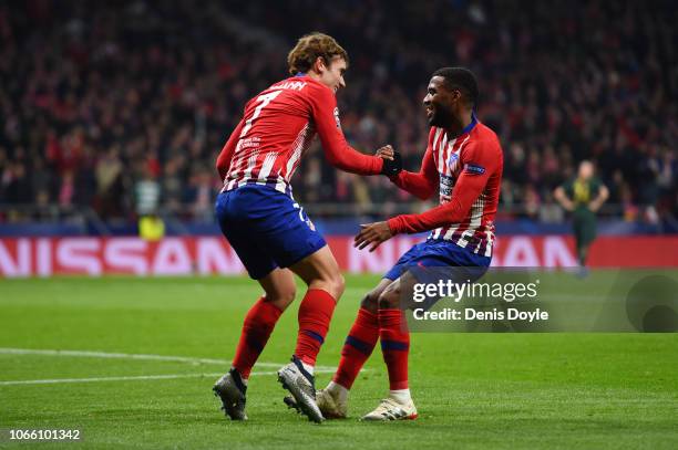 Antoine Griezmann of Atletico Madrid celebrates after scoring his team's second goal with Thomas Lemar of Atletico Madrid during the UEFA Champions...