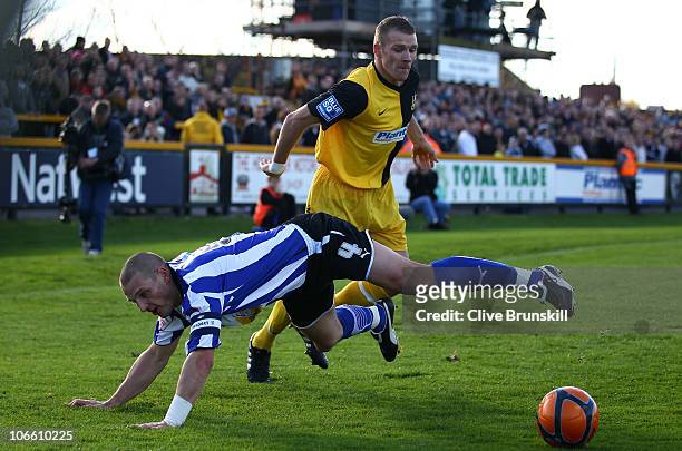 Chris Simm of Southport in action with Darren Purse of Sheffield Wednesday during the FA Cup sponsored by E.ON first Round match between Southport...