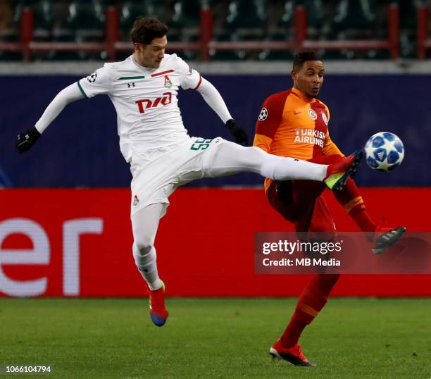 Aleksei Miranchuk of FC Lokomotiv Moscow and Fernando of Galatasaray vie for the ball during the Group D match of the UEFA Champions League between...