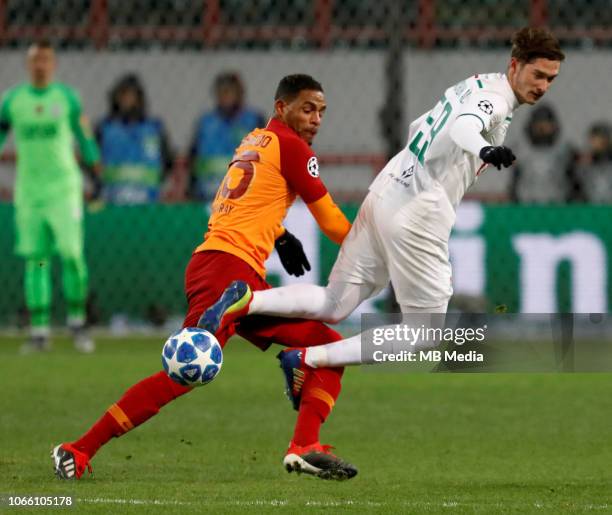 Aleksei Miranchuk of FC Lokomotiv Moscow and Fernando of Galatasaray vie for the ball during the Group D match of the UEFA Champions League between...