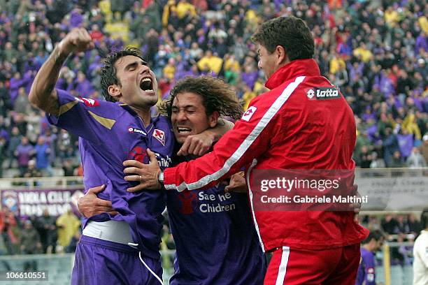 Alessio Cerci and Adrioan Mutu of ACF Fiorentina celebrate after scoring a goal during the Serie A match between Fiorentina and Chievo at Stadio...