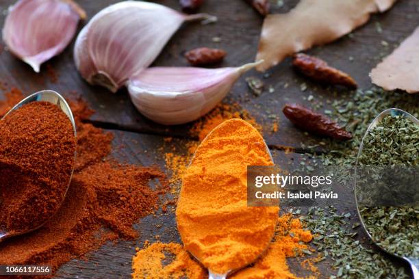 spices, garlics and herbs - chilli powder stock-fotos und bilder