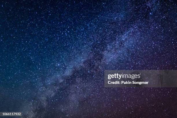 milky way galaxy with stars and space dust in the universe - galaxy background stock-fotos und bilder