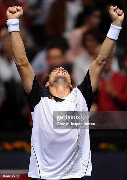 David Ferrer of Spain celebrates his straight set win over his fellow countryman Marcel Granollers in the final match of the ATP 500 World Tour...